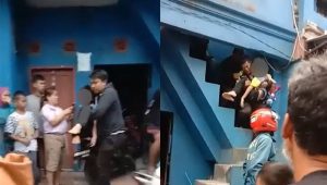 Tangkapan layar video penyelamatan anak korban penganiayaan ayah kandung di Cimahi. | ist