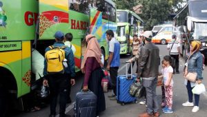 Pemudik mengggunakan bus. | Ist