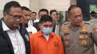 Andi Pangerang Hasanuddin menggunakan rompi tahanan dalam kasus ujaran kebencian. | Antara