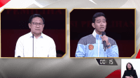 Calon wakil presiden (cawapres) nomor urut 1 dan 2 Muhaimin Iskandar (Cak Imin) dan Gibran Rakabuming Raka dalam debat Pilpres keempat di JCC, Jakarta Pusat, Minggu, 21/1/2024 | YouTube KPU RI