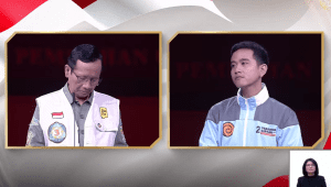 Calon wakil presiden (cawapres) nomor urut 3 dan 2, Mahfud MD dan Gibran Rakabuming Raka, dalam debat Pilpres keempat di JCC, Senayan, Jakarta Pusat, Minggu 21/1/2024 | YouTube KPU RI