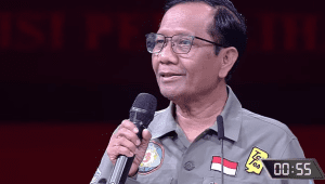 Calon wakil presiden (cawapres) nomor urut 3 Mahfud MD dalam debat Pilpres keempat di JCC, Jakarta Pusat, Minggu, 21/1/2024 | YouTube KPU RI