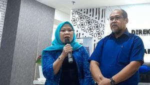 Pegawai Kementerian Pendidikan Tinggi, Sains, dan Teknologi (Kemendiktisaintek), Neni Suherlina, di Kemendiktisaintek, Jakarta Selatan, Selasa, 21/1/2025.