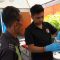 Direktorat Reserse Narkoba (Ditresnarkoba) Polda Metro Jaya saat menggelar kegiatan tes urine bagi para pengemudi bus, di terminal Kalideres, Jumat, 21/3/2025 | Ari Kurniansyah/Forum Keadilan