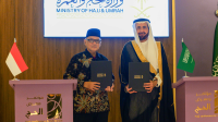 Menteri Haji dan Umrah RI, H. Mochamad Irfan Yusuf (Gus Irfan), dan Menteri Haji dan Umrah Arab Saudi, Tawfiq bin Fawzan Al-Rabiah menandatangani nota kesepahaman (MoU) dengan Kementerian Haji dan Umrah Kerajaan Arab Saudi terkait penyelenggaraan ibadah haji tahun 1447 H / 2026 M, pada pada Selasa 11/11/2025. | Dok Kementerian Haji dan Umrah RI
