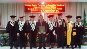 Pengamat Politik dan Militer Universitas Nasional (UNAS) Dr. Selamat Ginting dalam Sidang Senat Terbuka Promosi Doktor pada Kamis, 26/2/2026 | Dok. Universitas Nasional (UNAS)
