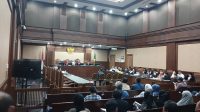 Mantan Direktur Pelaksana 4 Lembaga Pembiayaan Ekspor Indonesia (LPEI) Henry Sihotang saat bersaksi di Pengadilan Tipikor Jakarta, Senin, 27/7/2026 | Syahrul Baihaqi/Forum Keadilan