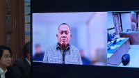 Eks Waka BGN Lodewyk Pusung saat memberikan keterangan secara online di ruang sidang Pengadilan Negeri Jakarta Pusat, Kamis, 20/8/2026 | Syahrul Baihaqi/Forum Keadilan
